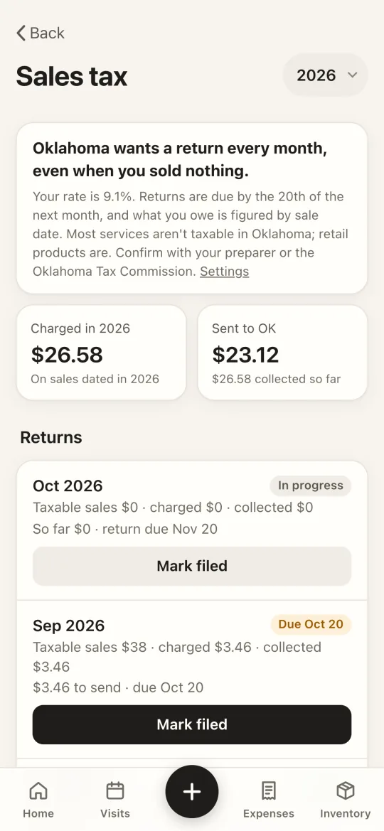 Moonkeel's sales tax screen with charged and sent totals and a list of monthly returns to mark as filed.